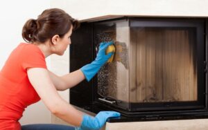cleaning-the-fireplace-glass-maintaining-a-gas-fireplace-Cumming-Home-HVAC